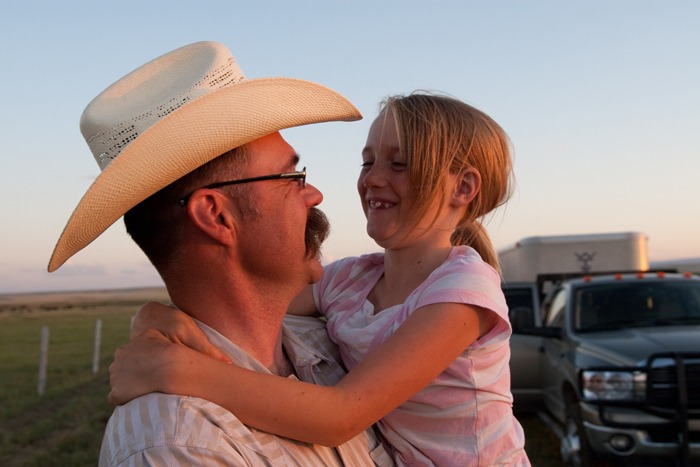 Darrell Stevenson with his daughter, Claire, on their ranch in Montana in the summer of 2010.