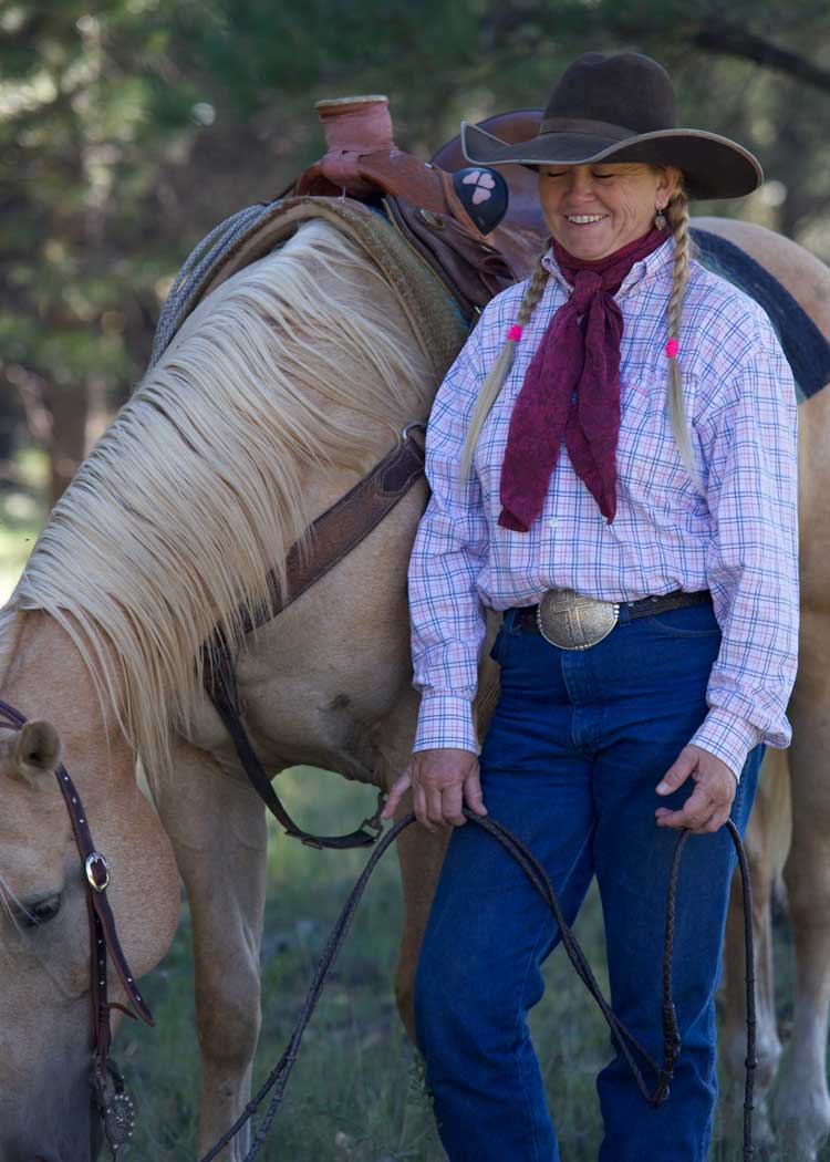 Sheila Carlson is saddled up at her cow camp in northern Arizona.