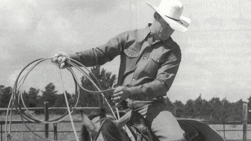 Clay O'Brien Cooper with a rope on a horse