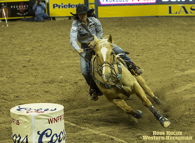 Hailey Kinsel turning DM Sissys Hayday around a barrel at the NFR
