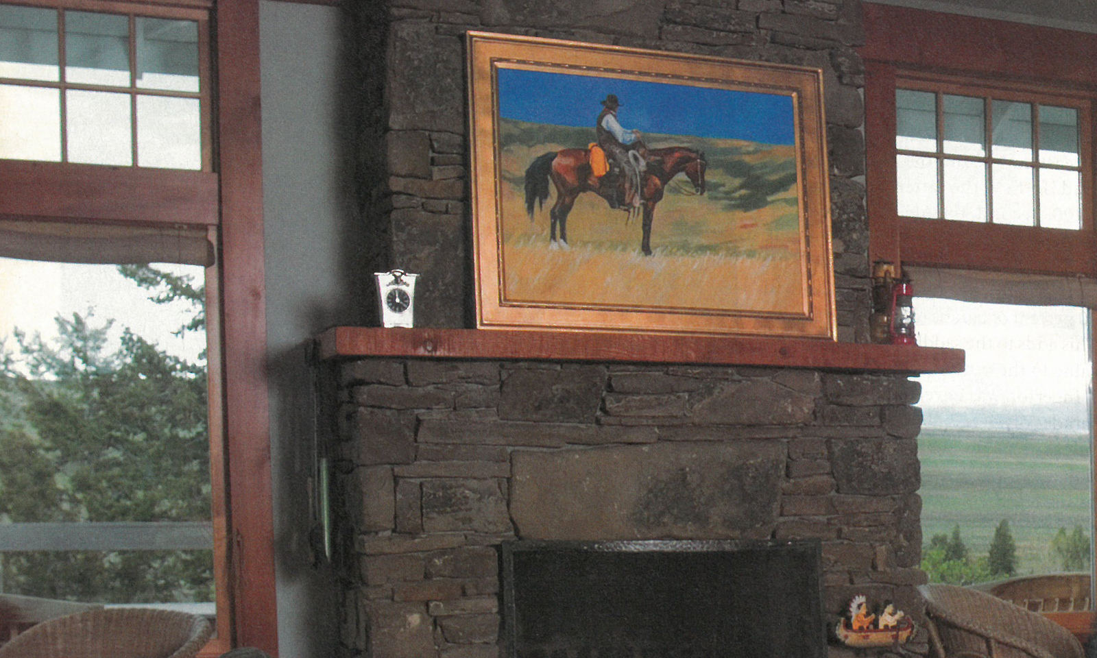 Lyn St. Clair painting above fireplace