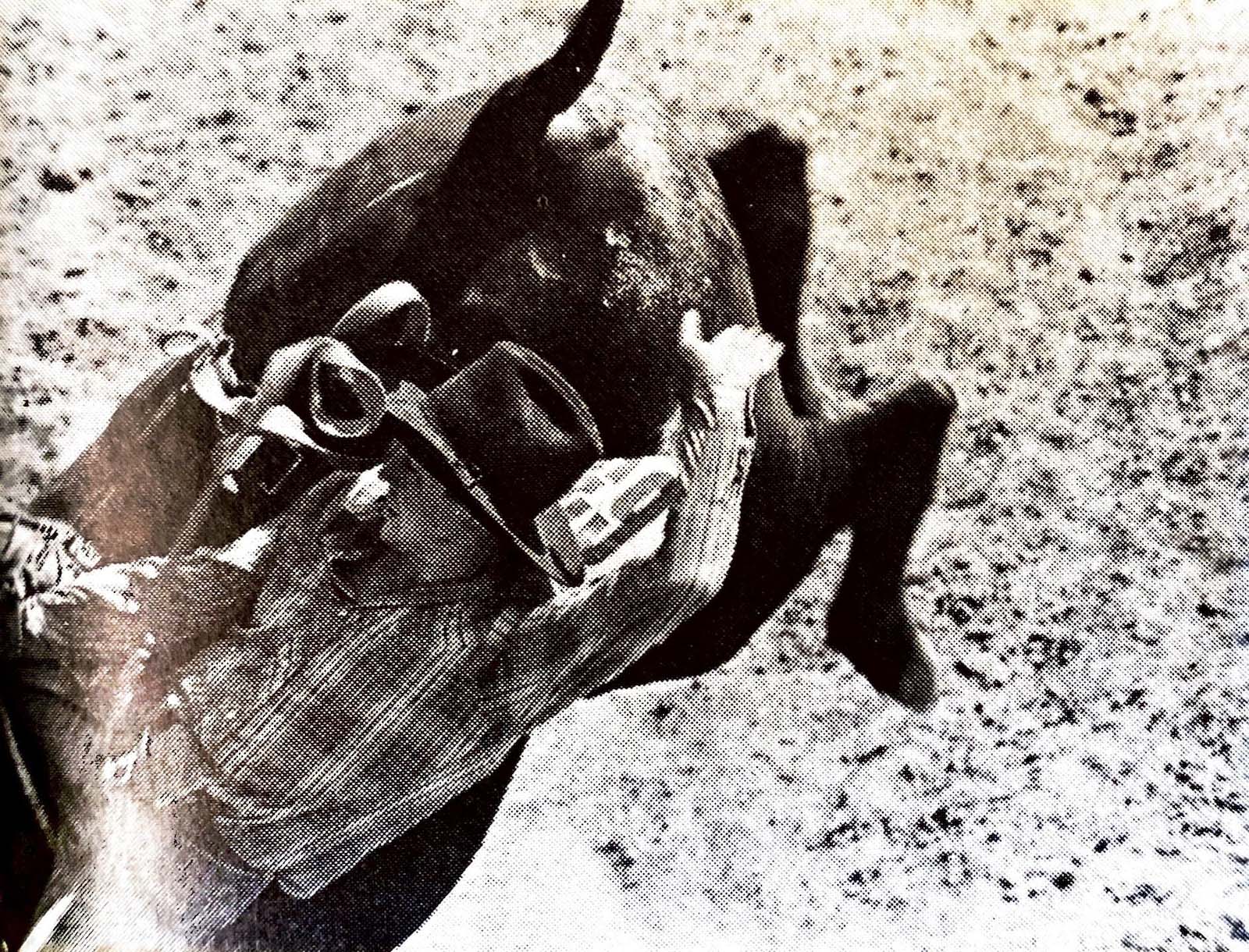 Cowboy getting bucked off a bull.