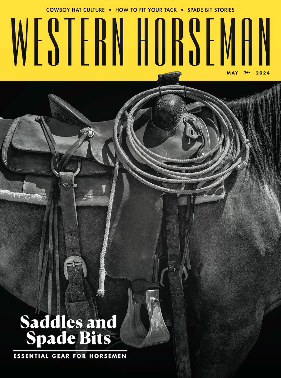 A horse with a saddle and rope on the cover of the Western Horseman magazine.