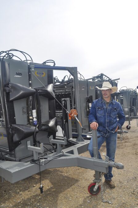 Jesse Pope standing next to the silencer
