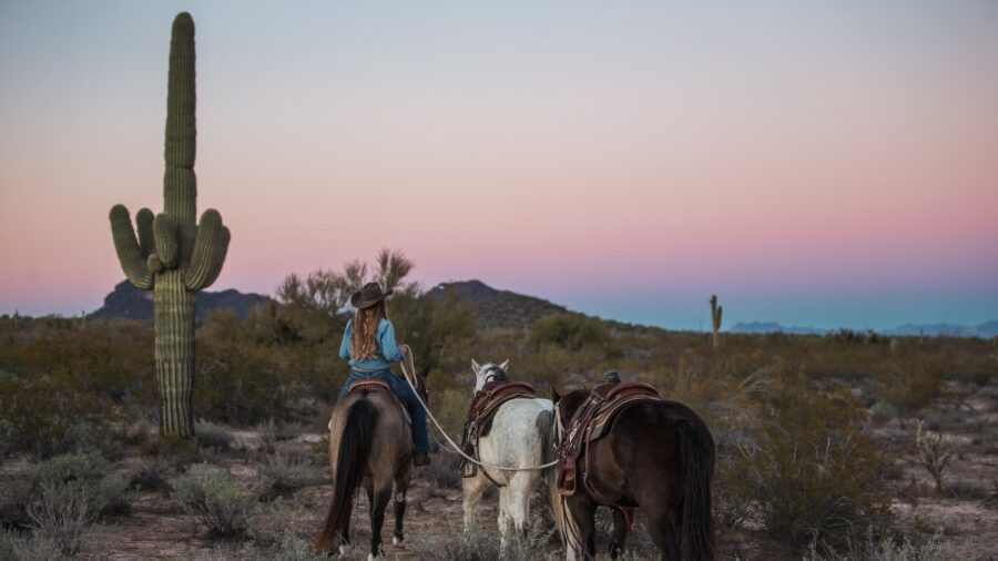 Jamie McElhaney riding through the Arizona desert