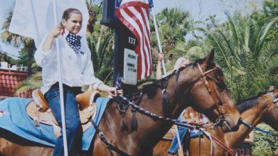 Young editor on horseback